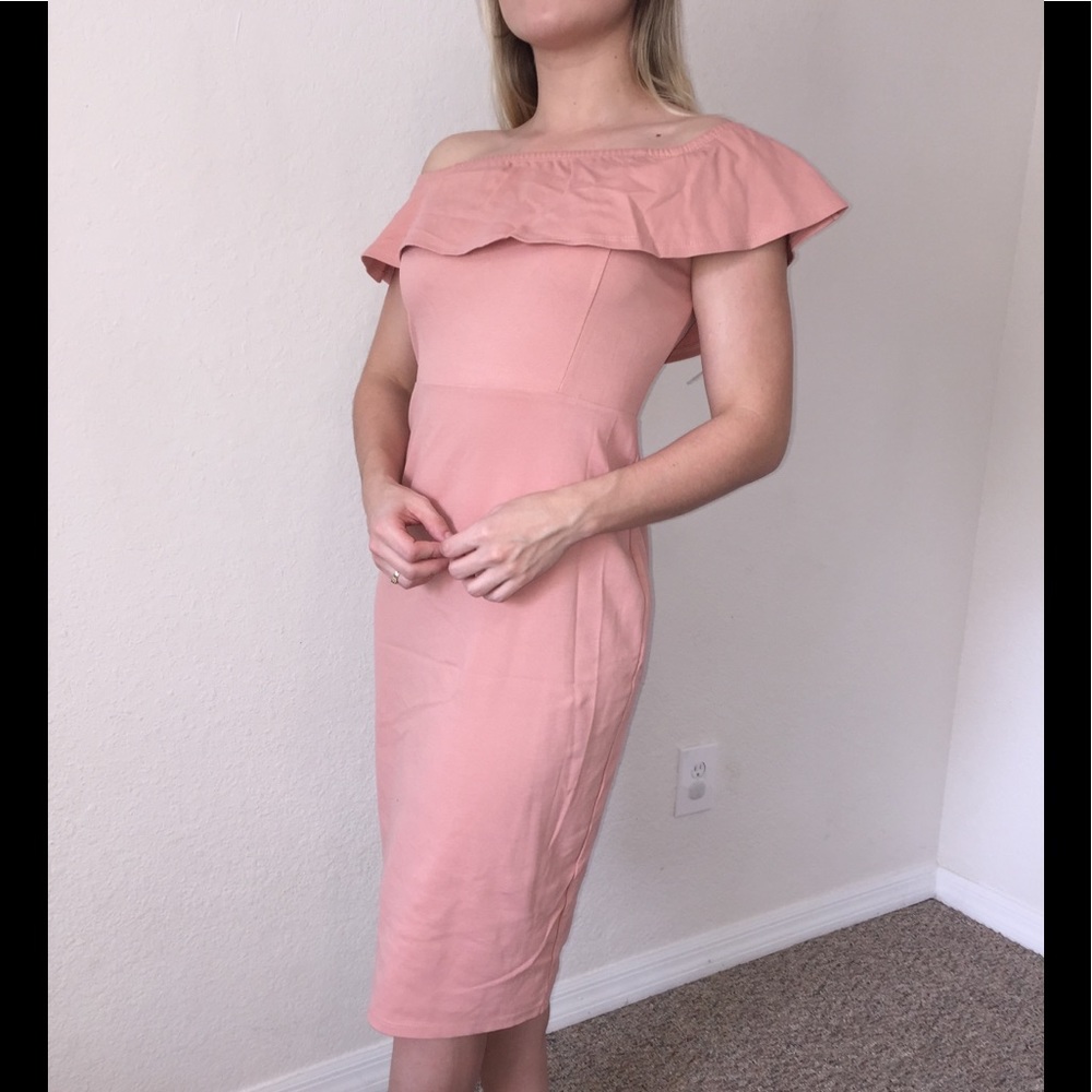 Beautiful blush color dress with a slit, worn once! Very comfortable fabric!